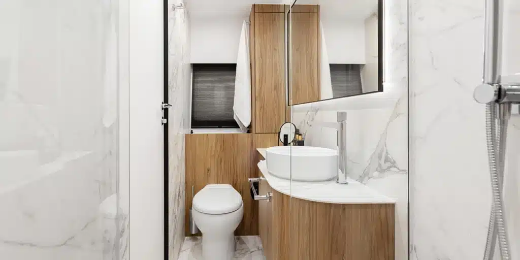 Full-moon-Moon-60-sailing-catamaran-for-charter-in-Balearic-islands-bathroom