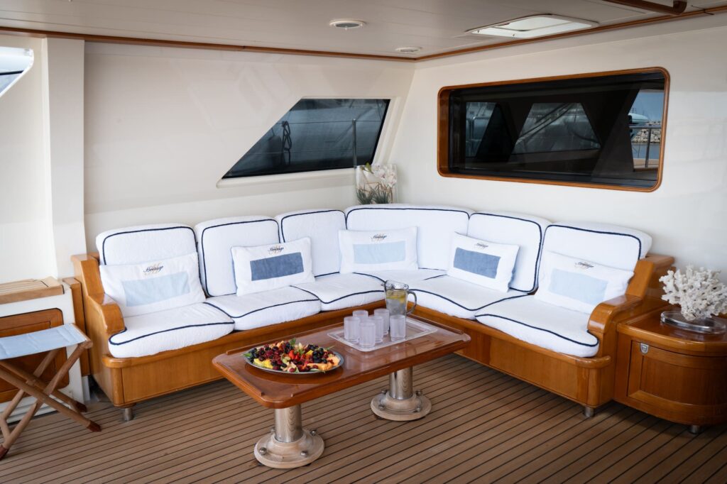 Heritage-M-Exterior-cockpit-sofa-yacht-for-charter-west-coast-international